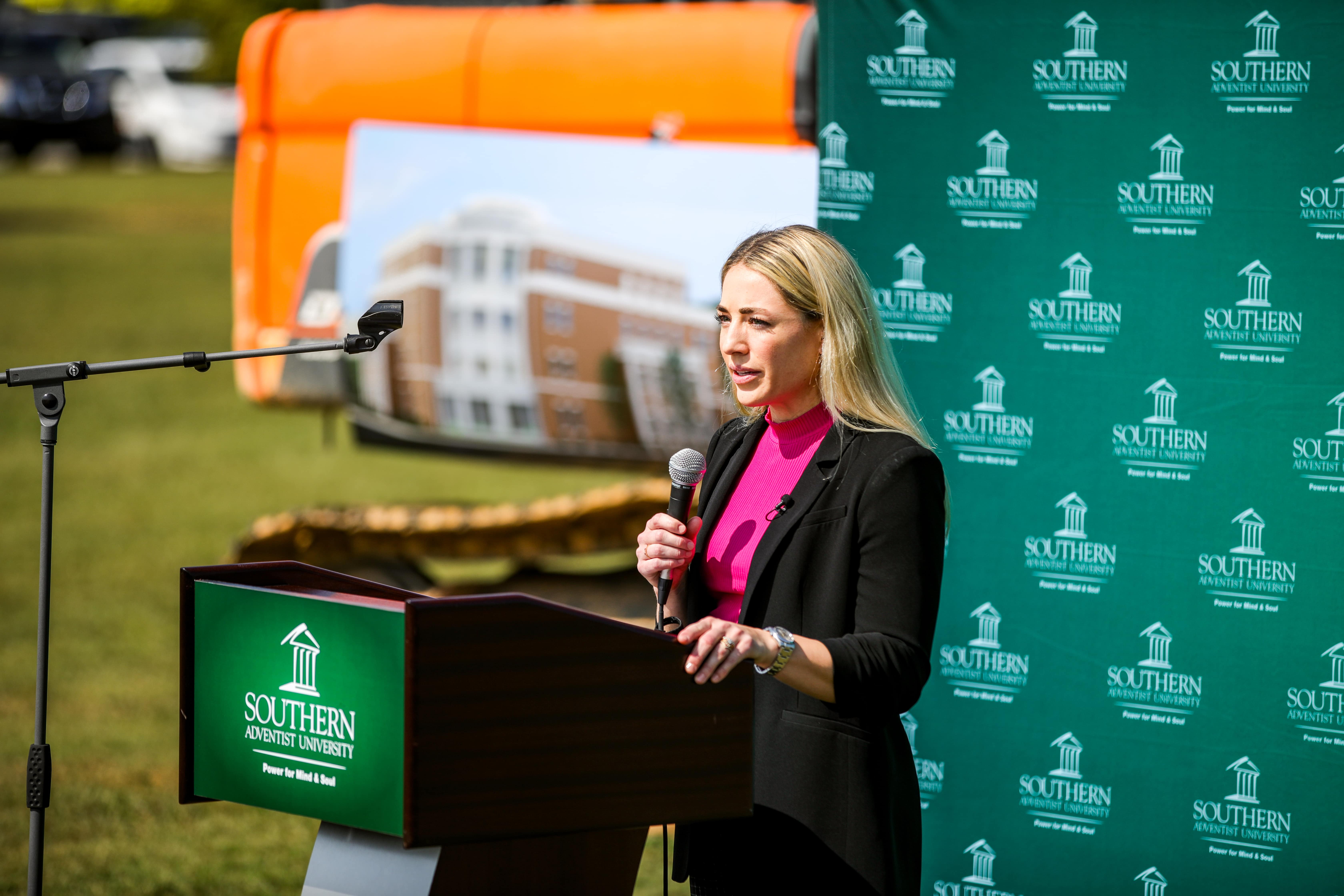 A person talking upfront