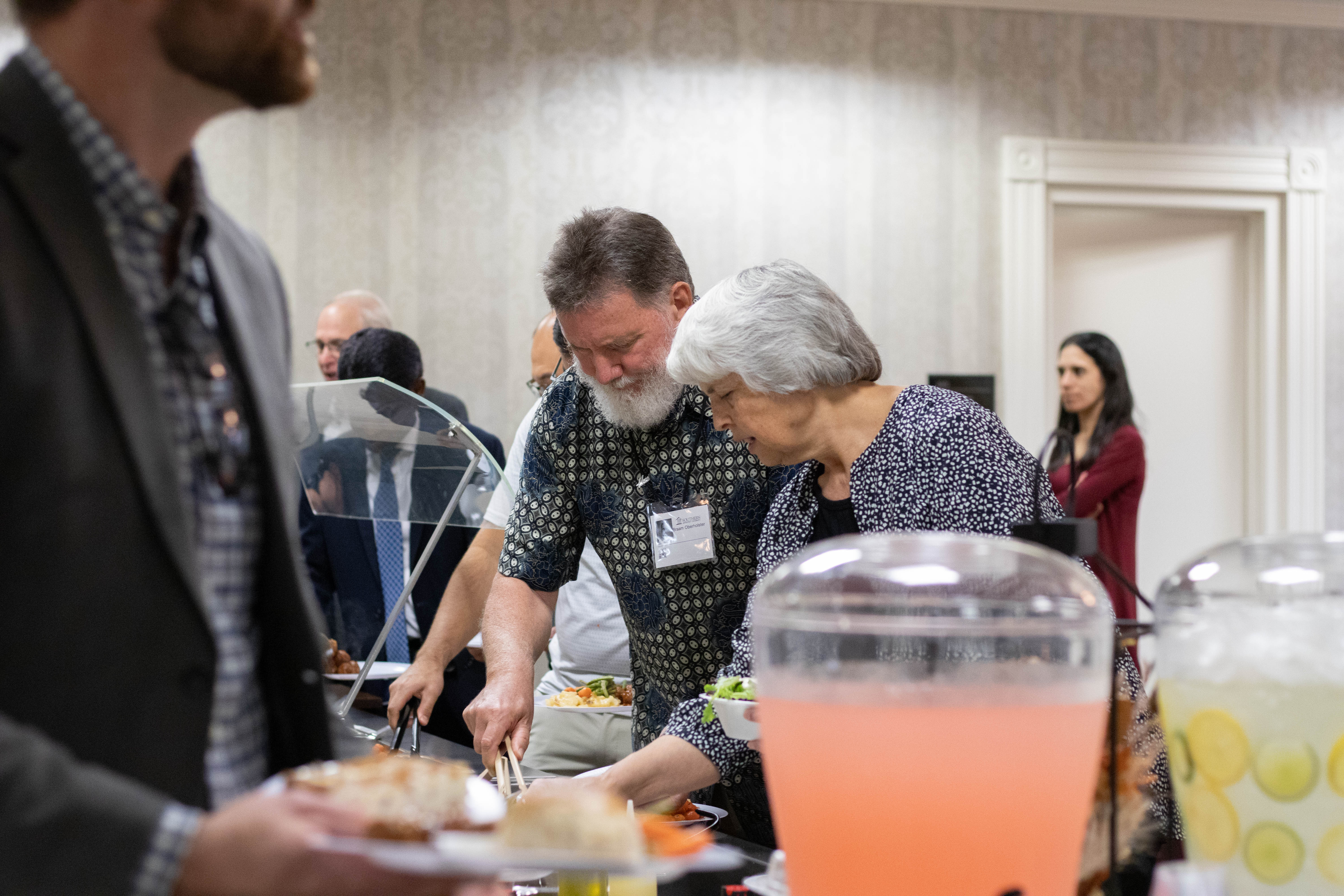 A person chatting and eating