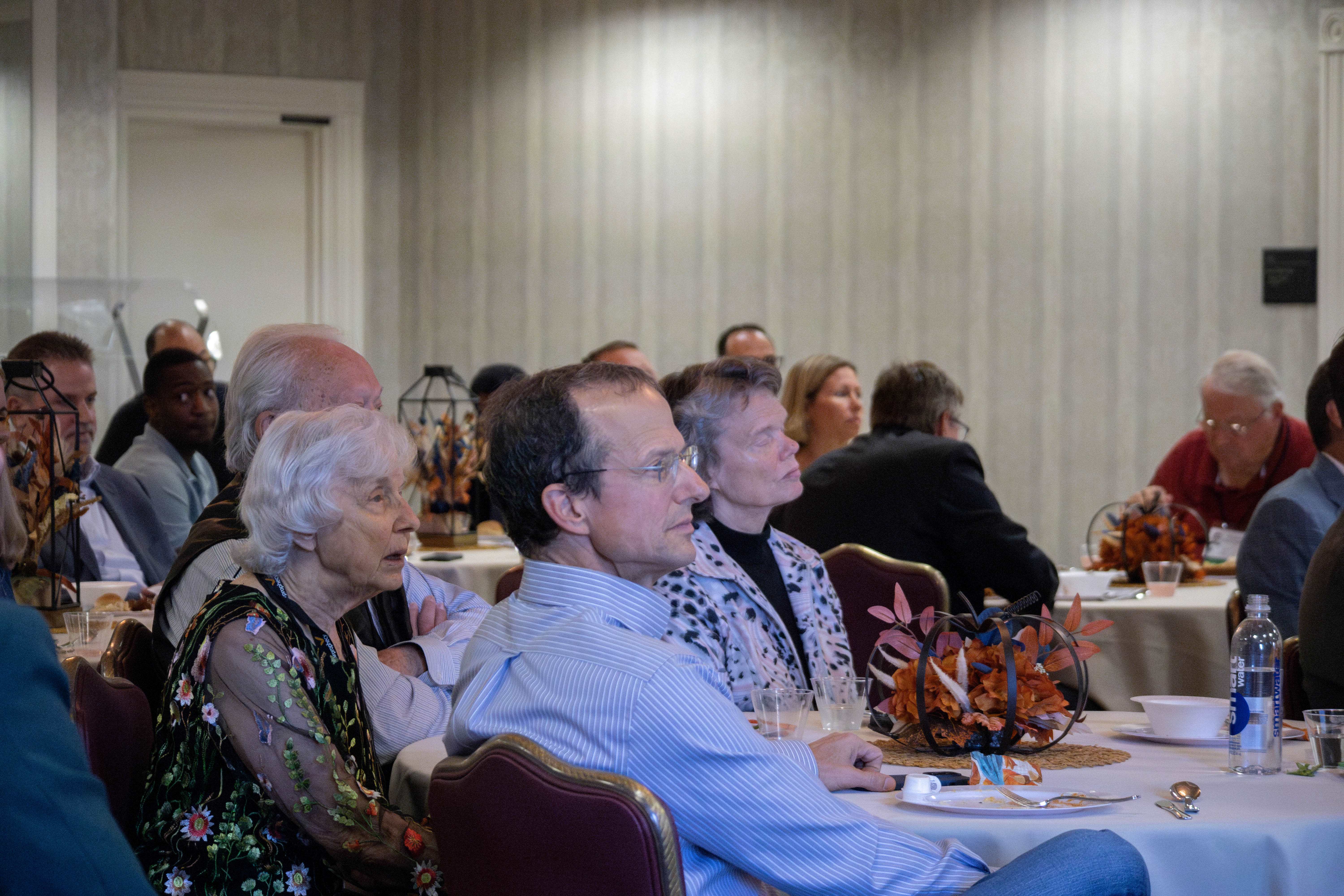 Everyone sitting and eating