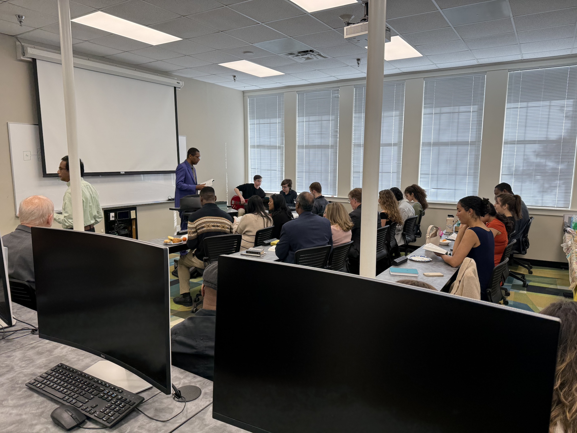 Reading the scripture and answering questions.