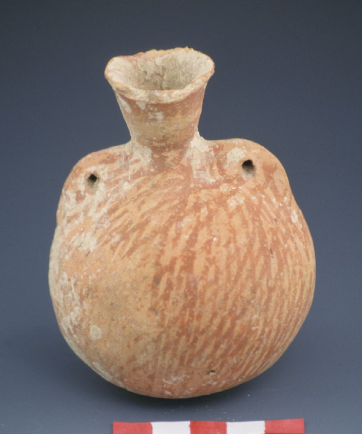 a light brown juglet