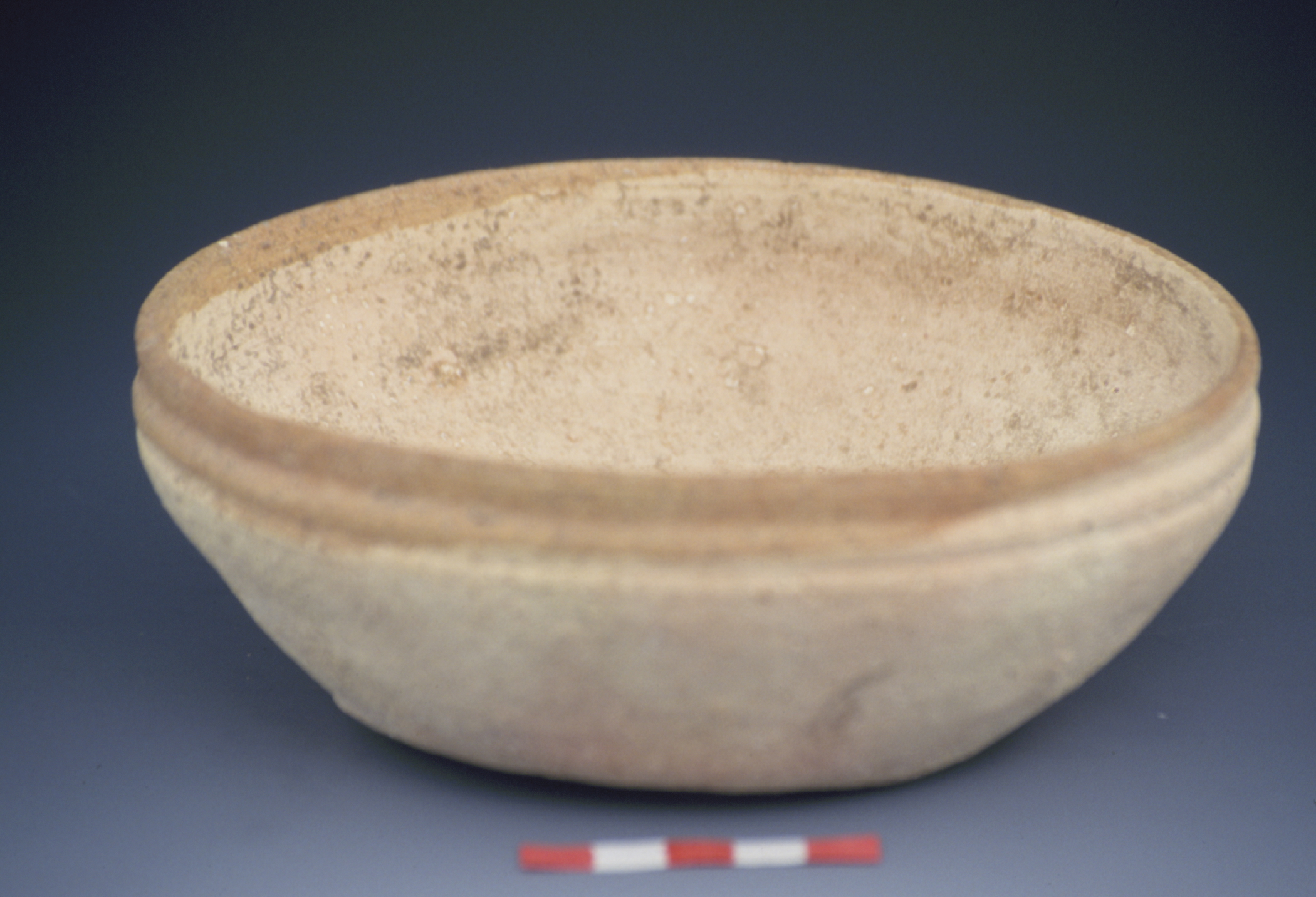 a tan carinated bowl
