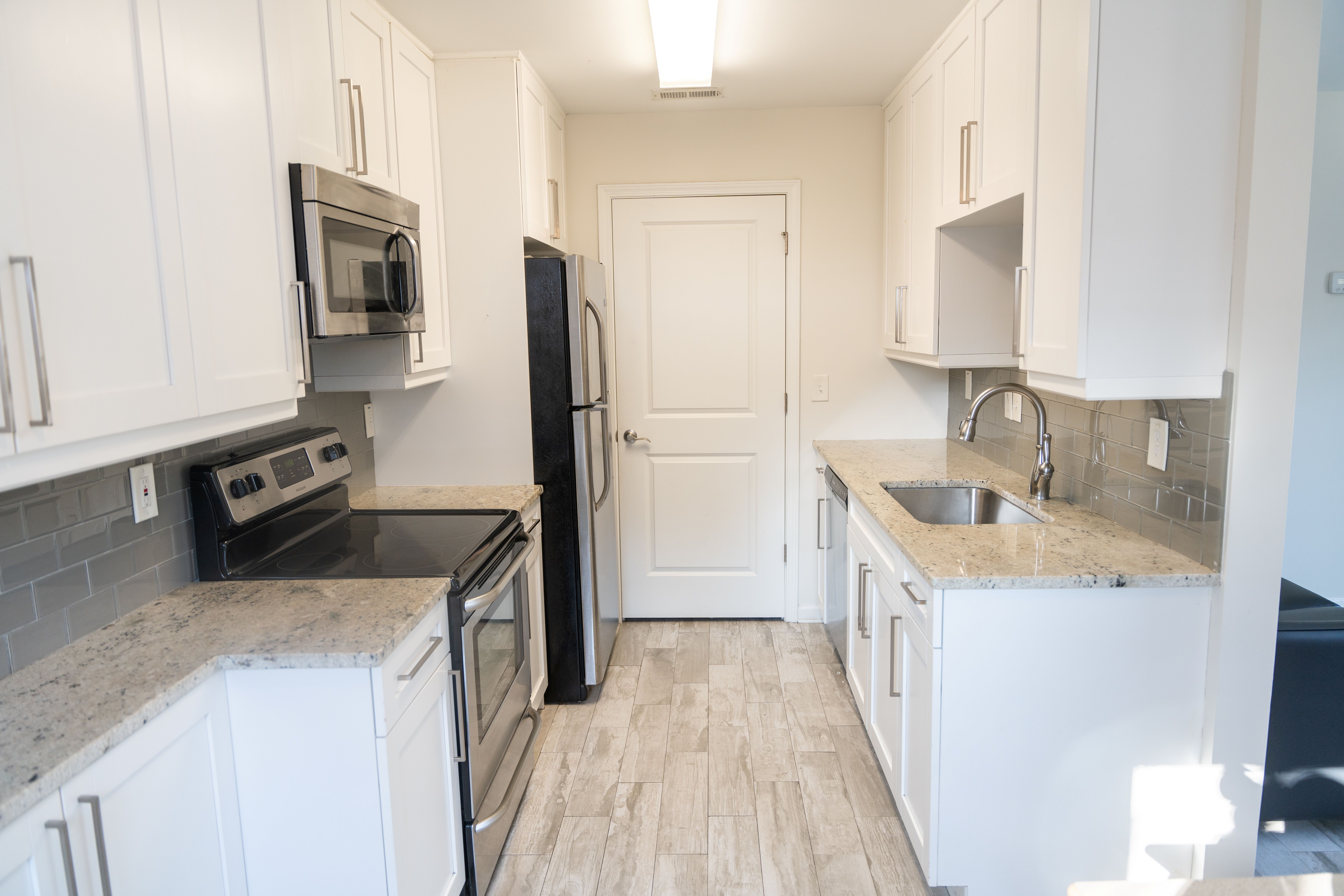 kitchen: fridge, microwave, stove