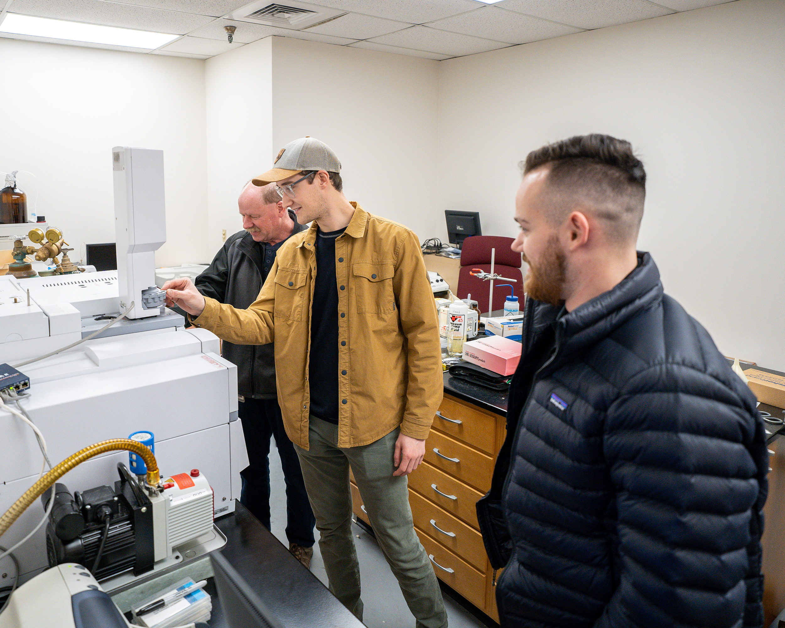 Chemists from McKee Foods visit a lab in Southern’s Chemistry Department where they can use equipment to troubleshoot. 