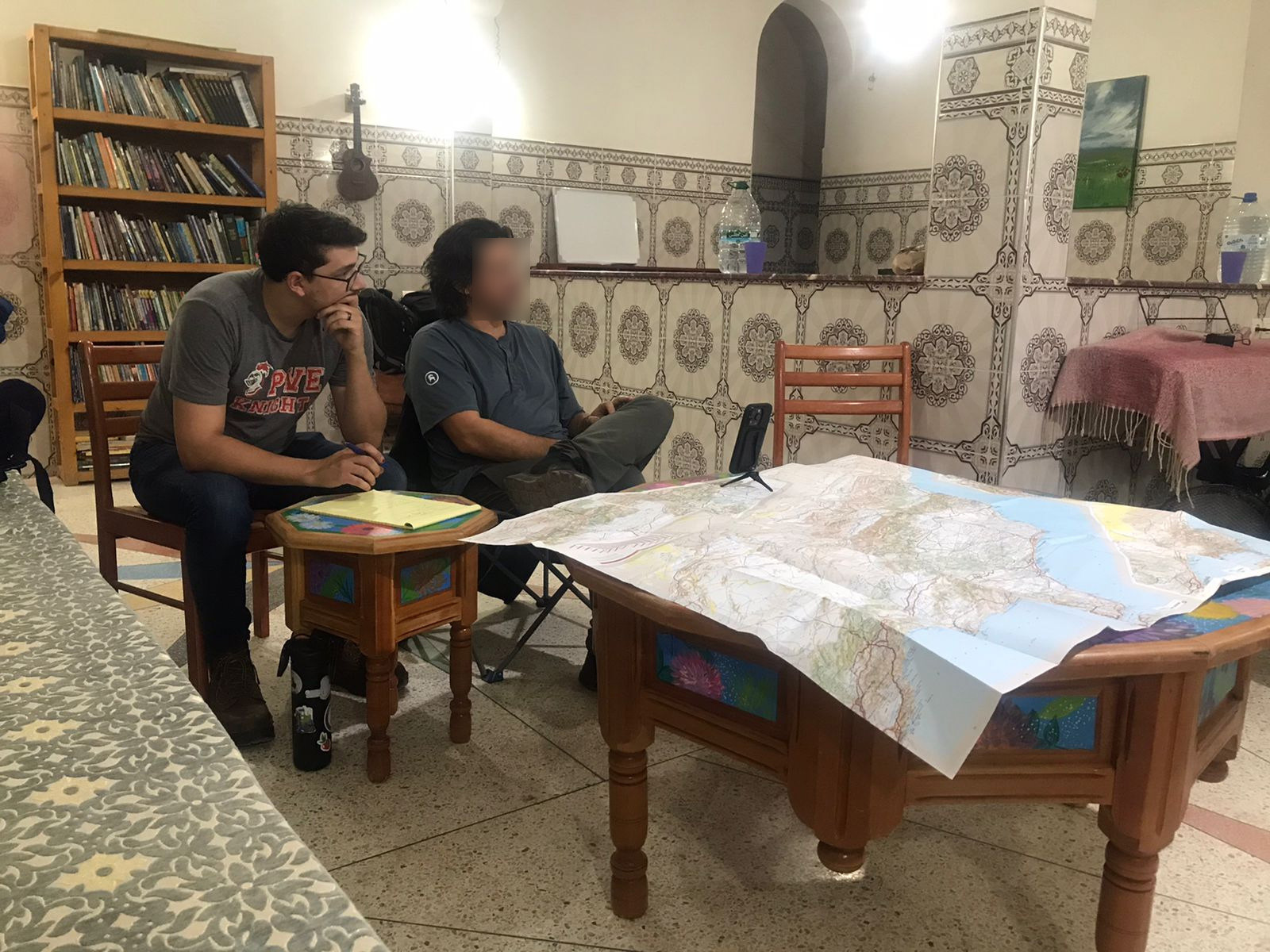 Southern Adventist University students with a map