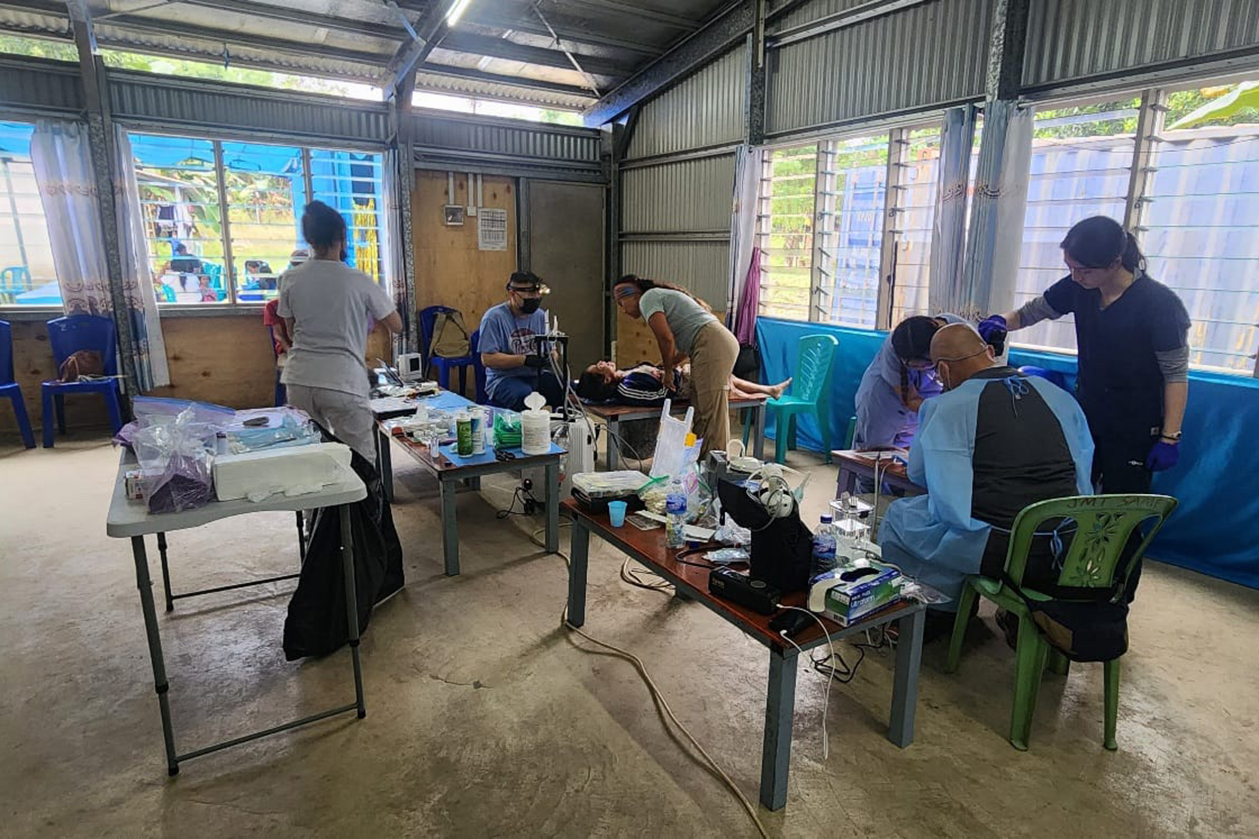 Missionaries hold a dental clinic