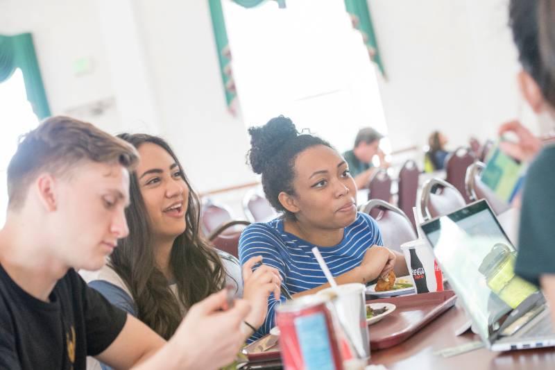 Students eating and talking in Cafeteria